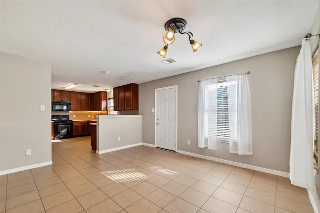 a view of a kitchen with a sink