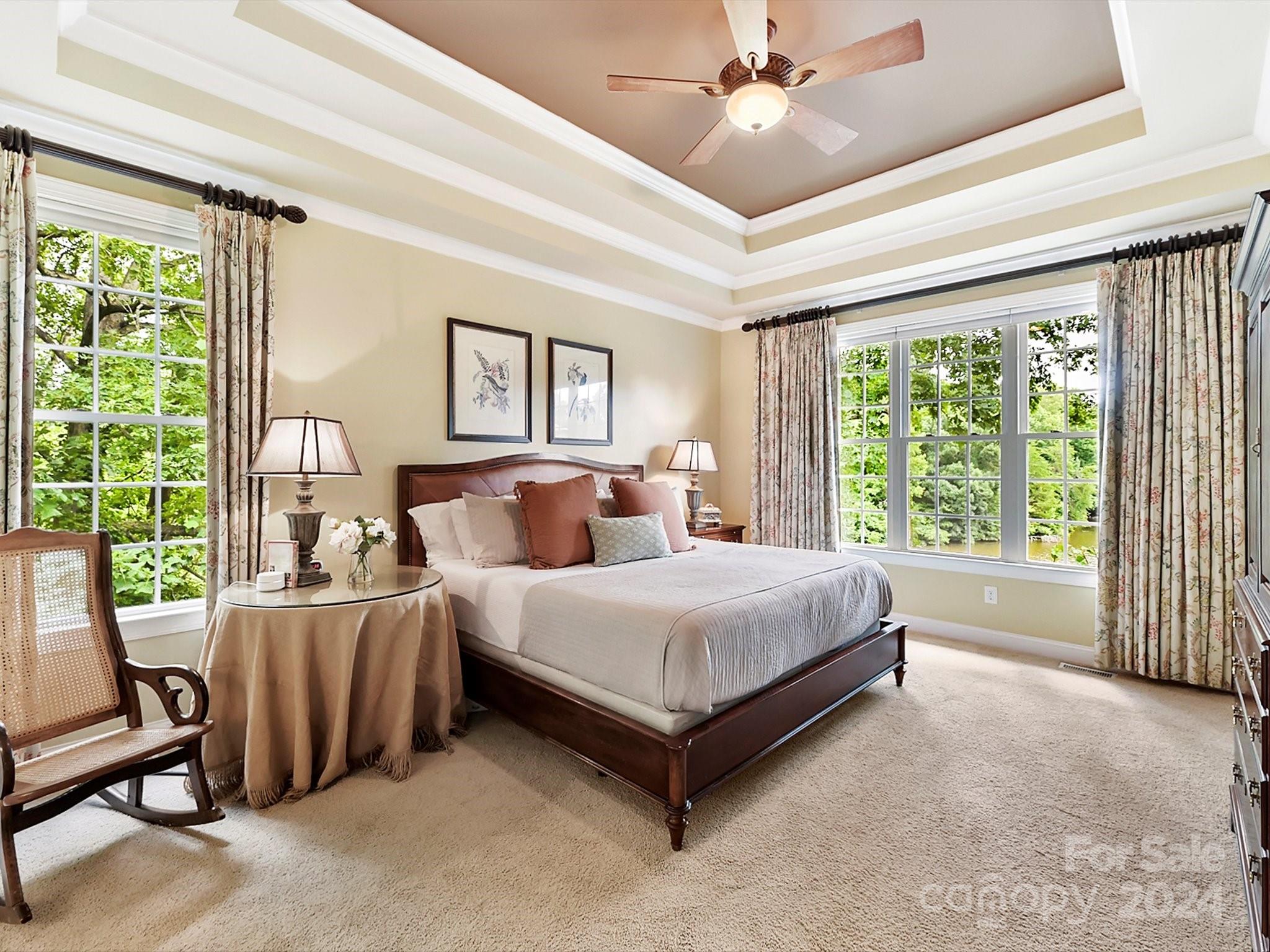146 Canterbury Crossing Fort Mill, SC 29708 - Photo 20 of 48 a spacious bedroom with a bed and a large window