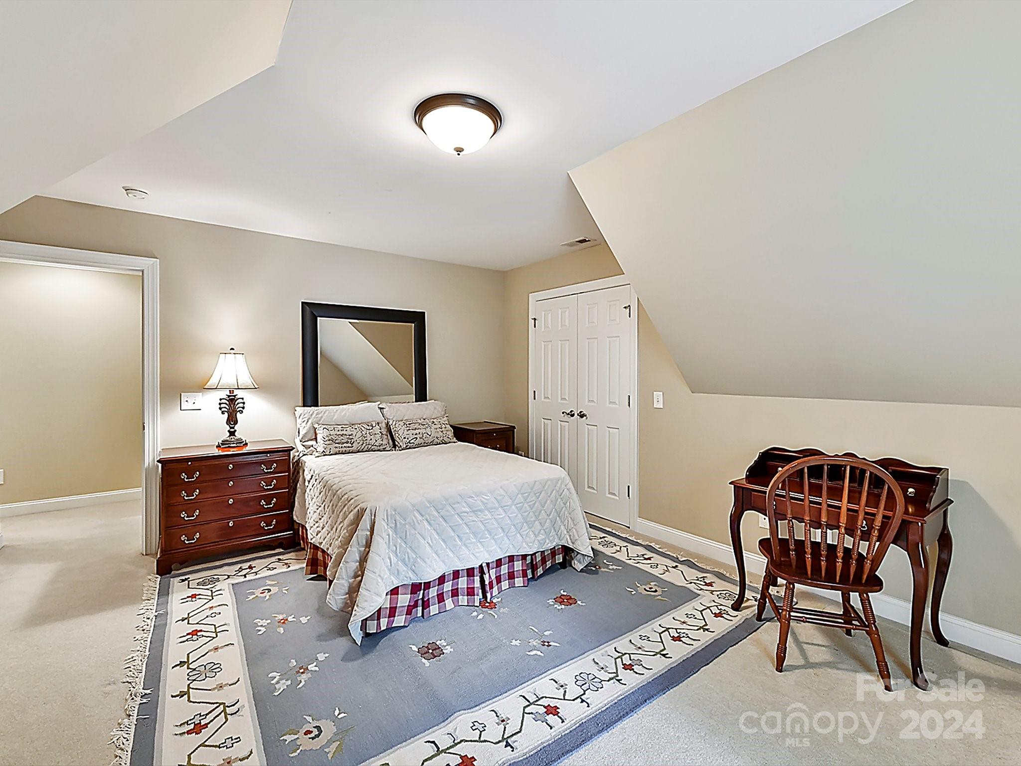 146 Canterbury Crossing Fort Mill, SC 29708 - Photo 29 of 48 a bed room with a bed and a chair