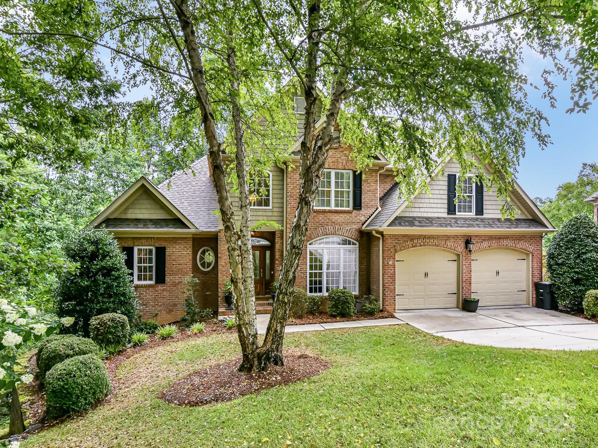 146 Canterbury Crossing Fort Mill, SC 29708 - Photo 3 of 48 front view of a house with a yard