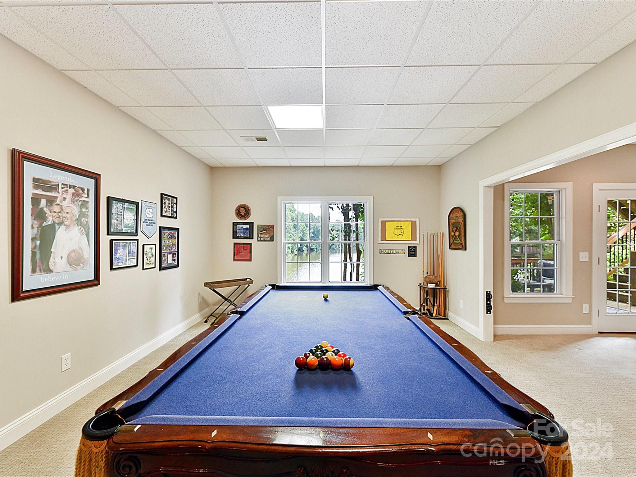 146 Canterbury Crossing Fort Mill, SC 29708 - Photo 32 of 48 a living room with furniture pool table and a large window