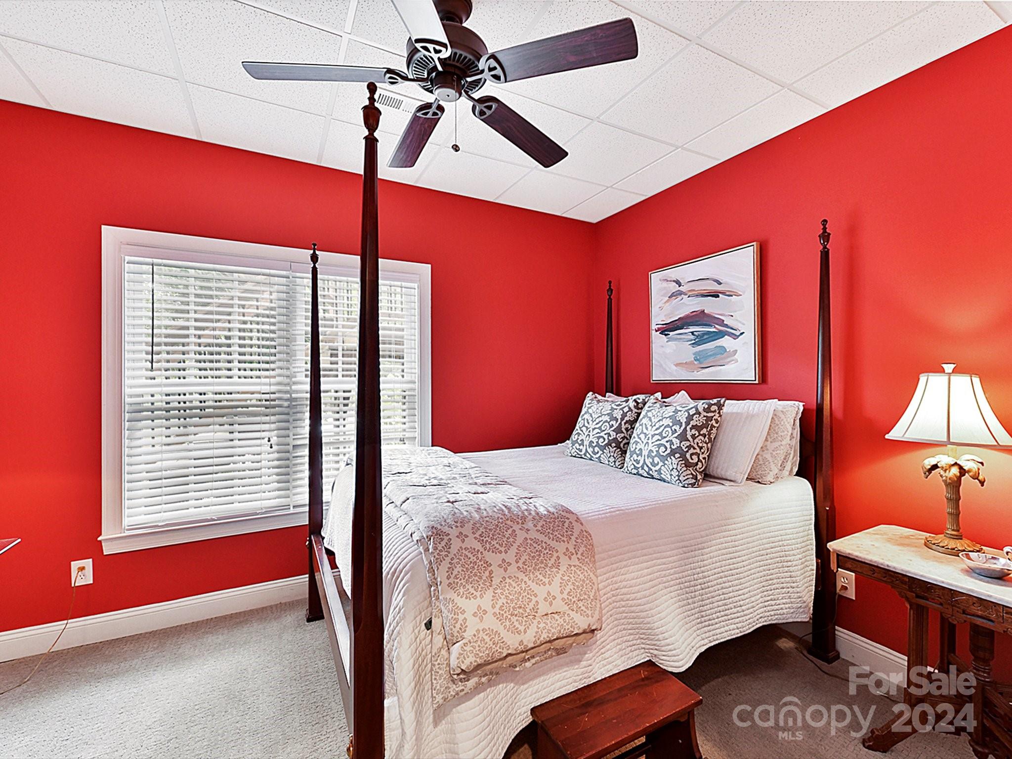 146 Canterbury Crossing Fort Mill, SC 29708 - Photo 37 of 48 a bedroom with a bed and a lamp