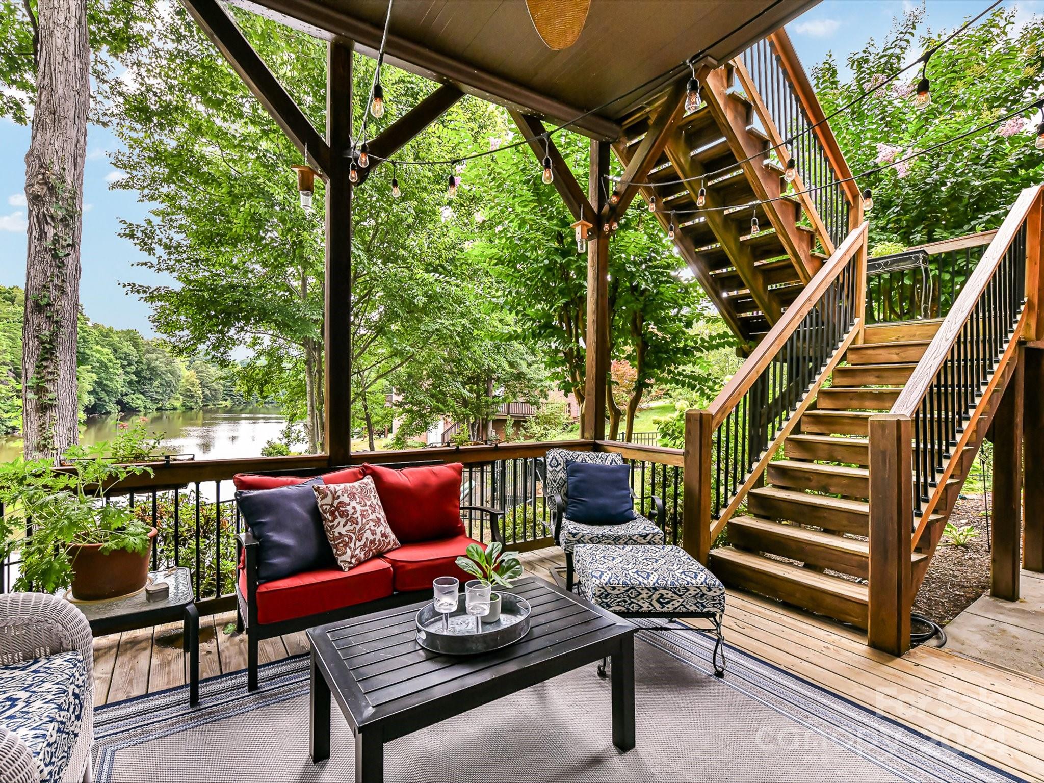146 Canterbury Crossing Fort Mill, SC 29708 - Photo 41 of 48 a outdoor living space with patio furniture and wooden floor