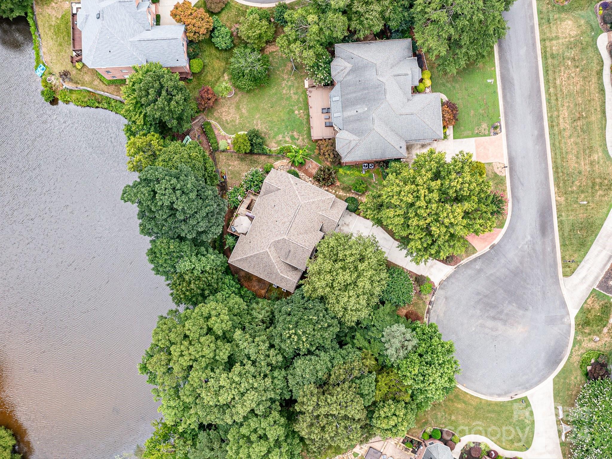 146 Canterbury Crossing Fort Mill, SC 29708 - Photo 46 of 48 an aerial view of a house with a yard and garden