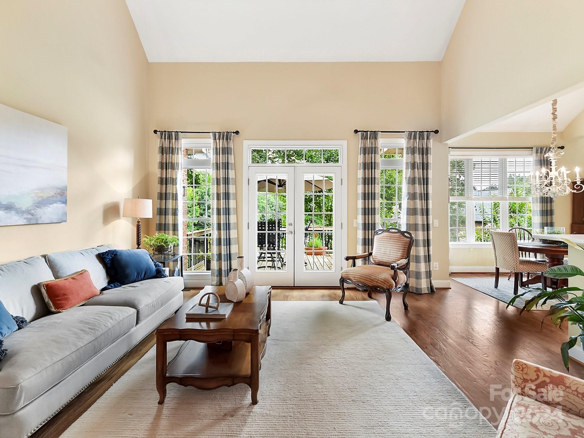 146 Canterbury Crossing Fort Mill, SC 29708 - Photo 9 of 48 a living room with furniture and floor to ceiling windows