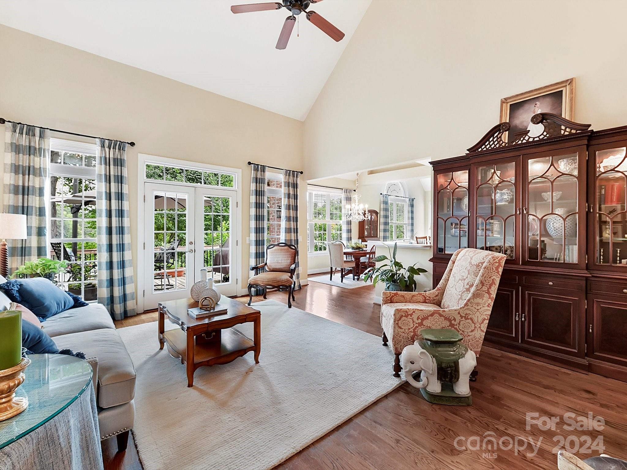 146 Canterbury Crossing Fort Mill, SC 29708 - Photo 10 of 48 a living room with furniture and a floor to ceiling window