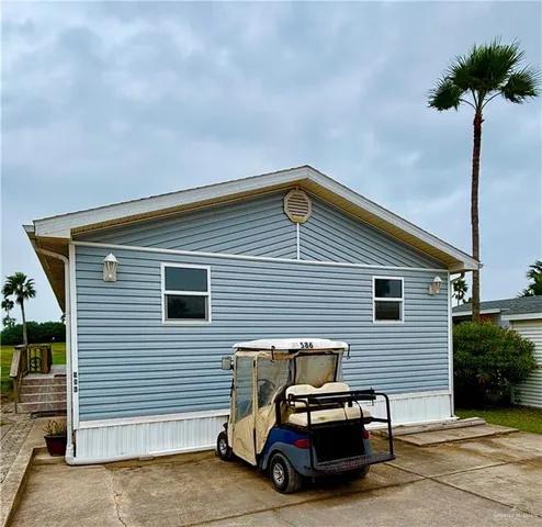 a car parked in front of a house