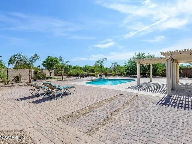 a view of a terrace with yard