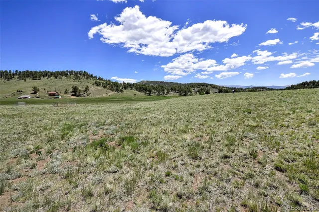 a view of a lake with a mountain in the background