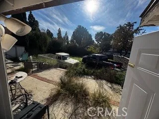 a view of balcony with wooden floor