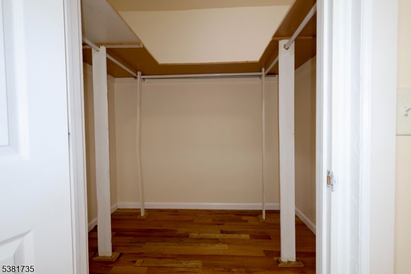 112 Chadwick Avenue, Unit 2 Newark, NJ 07108 - Photo 2 of 13 a view of walk in closet with wooden floor