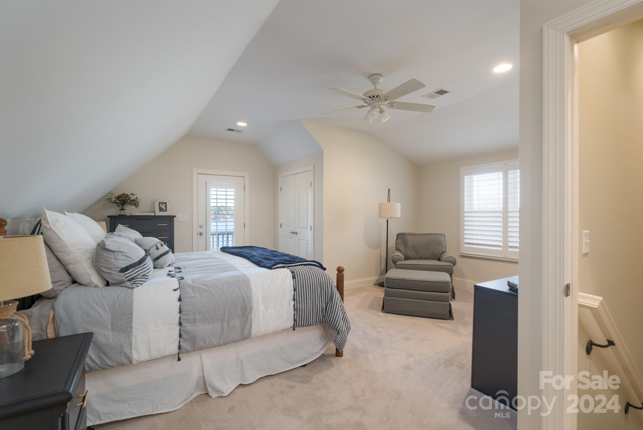 638 Deerfield Road Mount Gilead, NC 27306 - Photo 17 of 48 a bedroom with a bed and wooden floor