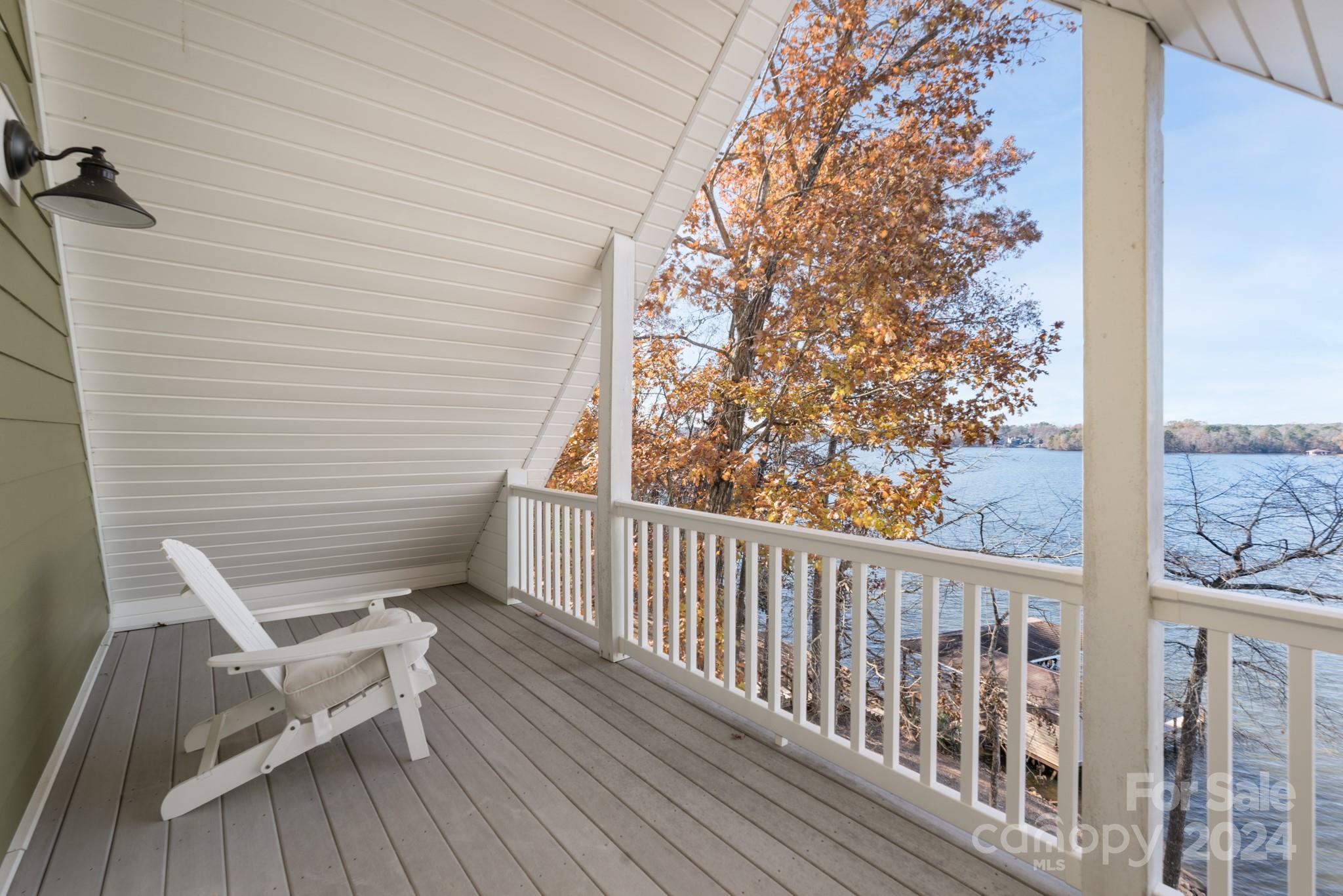 638 Deerfield Road Mount Gilead, NC 27306 - Photo 25 of 48 a view of a two chairs in the balcony