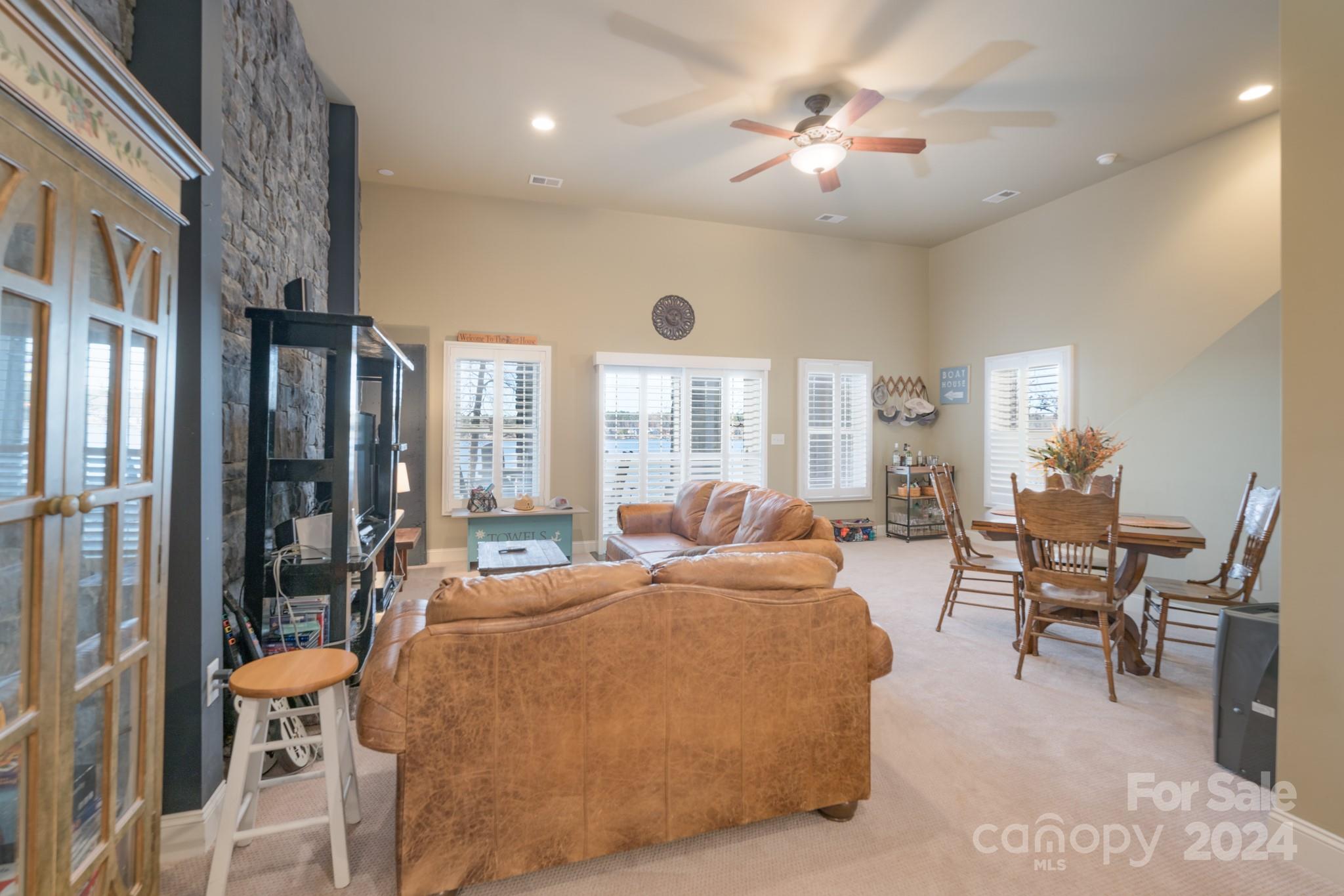 638 Deerfield Road Mount Gilead, NC 27306 - Photo 28 of 48 a large bedroom with furniture and large windows