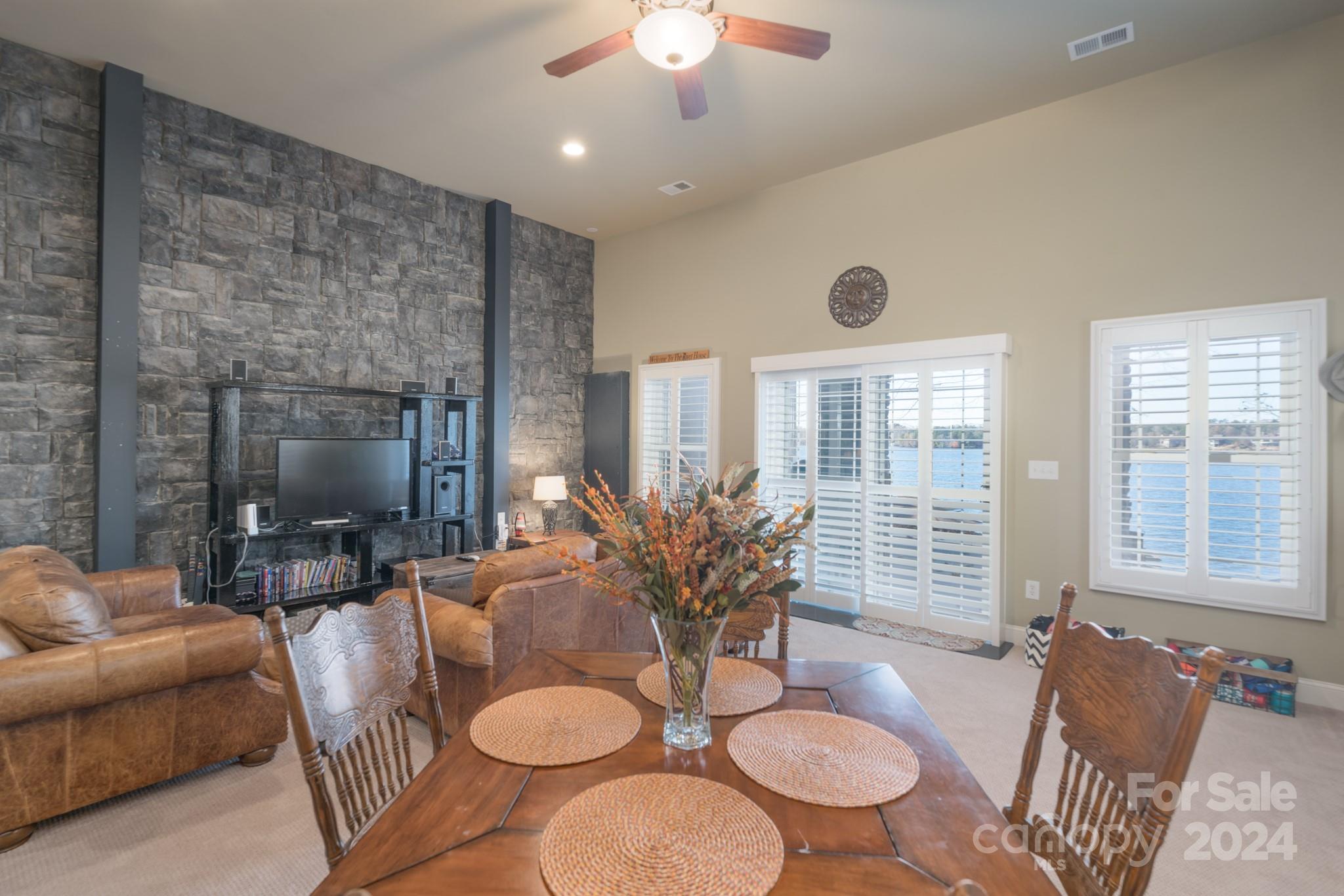 638 Deerfield Road Mount Gilead, NC 27306 - Photo 29 of 48 a living room with furniture and a large window
