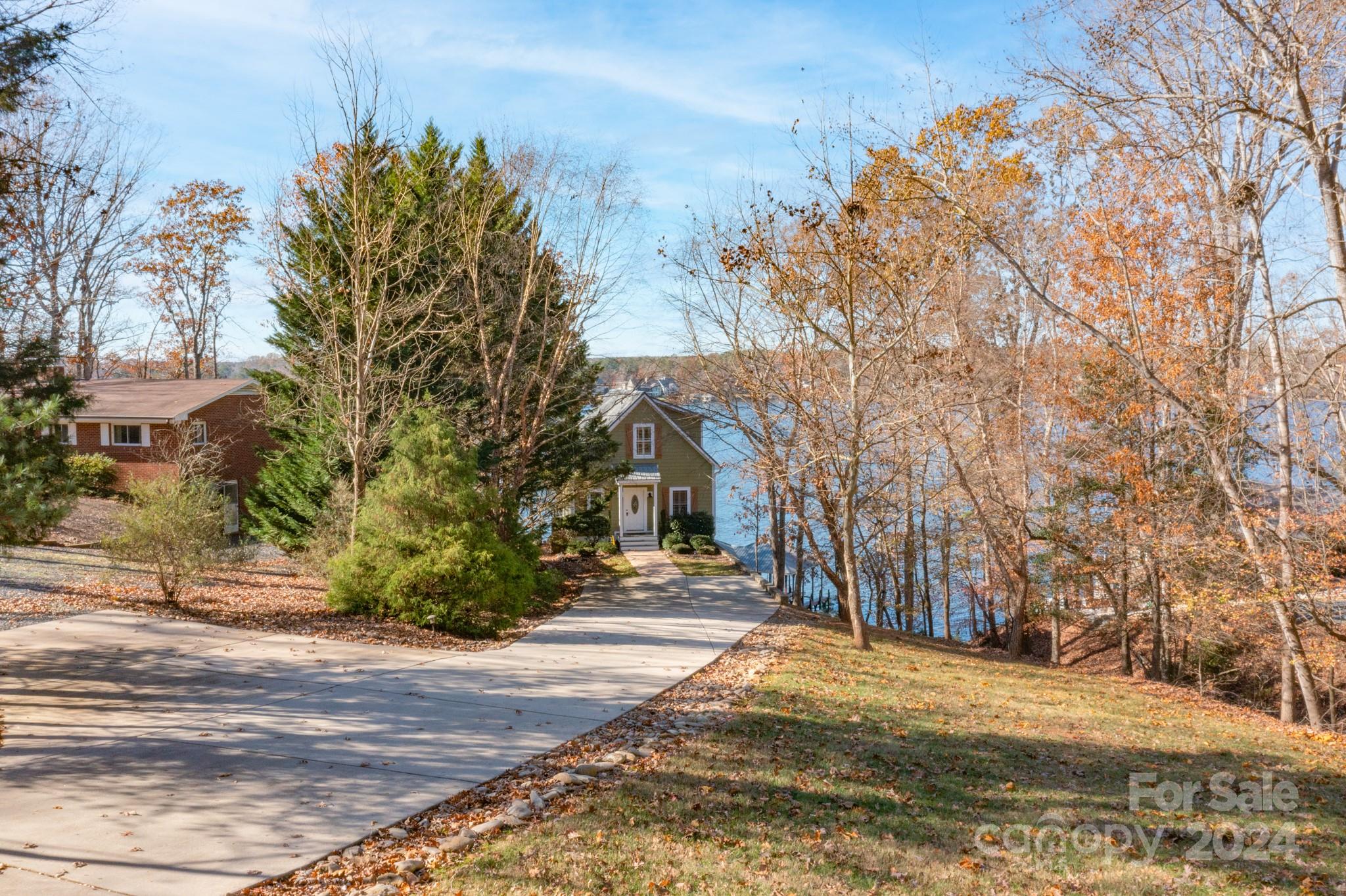 638 Deerfield Road Mount Gilead, NC 27306 - Photo 3 of 48 a view of road with large trees