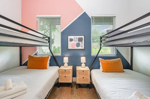 a bedroom with furniture and window