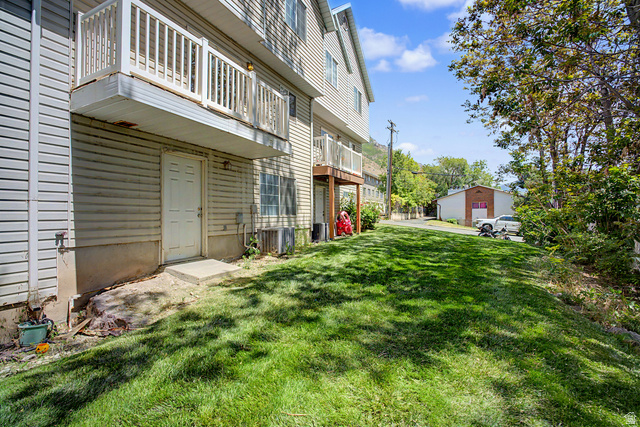 2058 California Avenue, Unit 2 Provo, UT 84606 - Photo 32 of 32 Expansive green lawn with established trees bordering the property