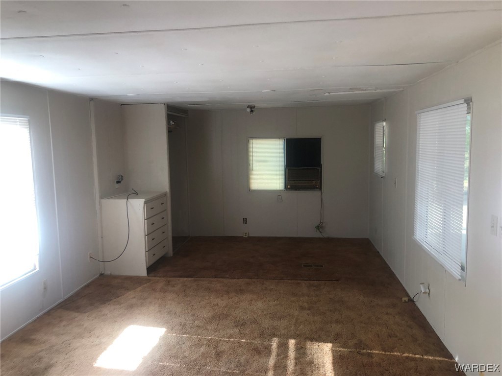 3617 Salt Road Golden Valley, AZ 86413 - Photo 7 of 22 an empty room with windows