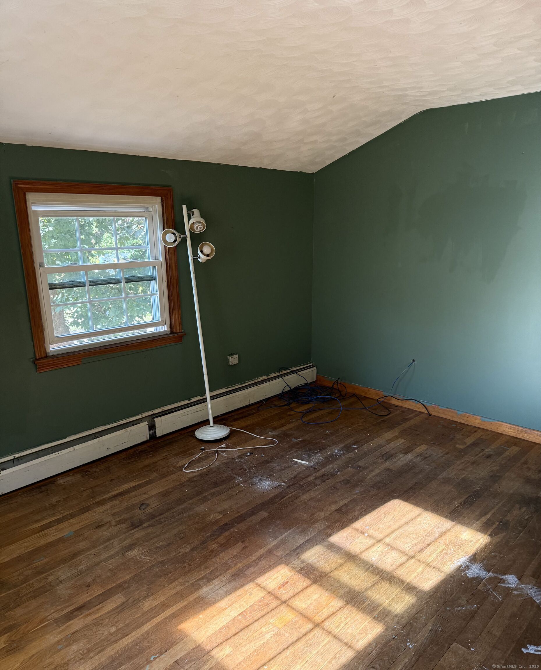 45 Monroe Road Enfield, CT 06082 - Photo 12 of 12 a view of a room with wooden floor and windows