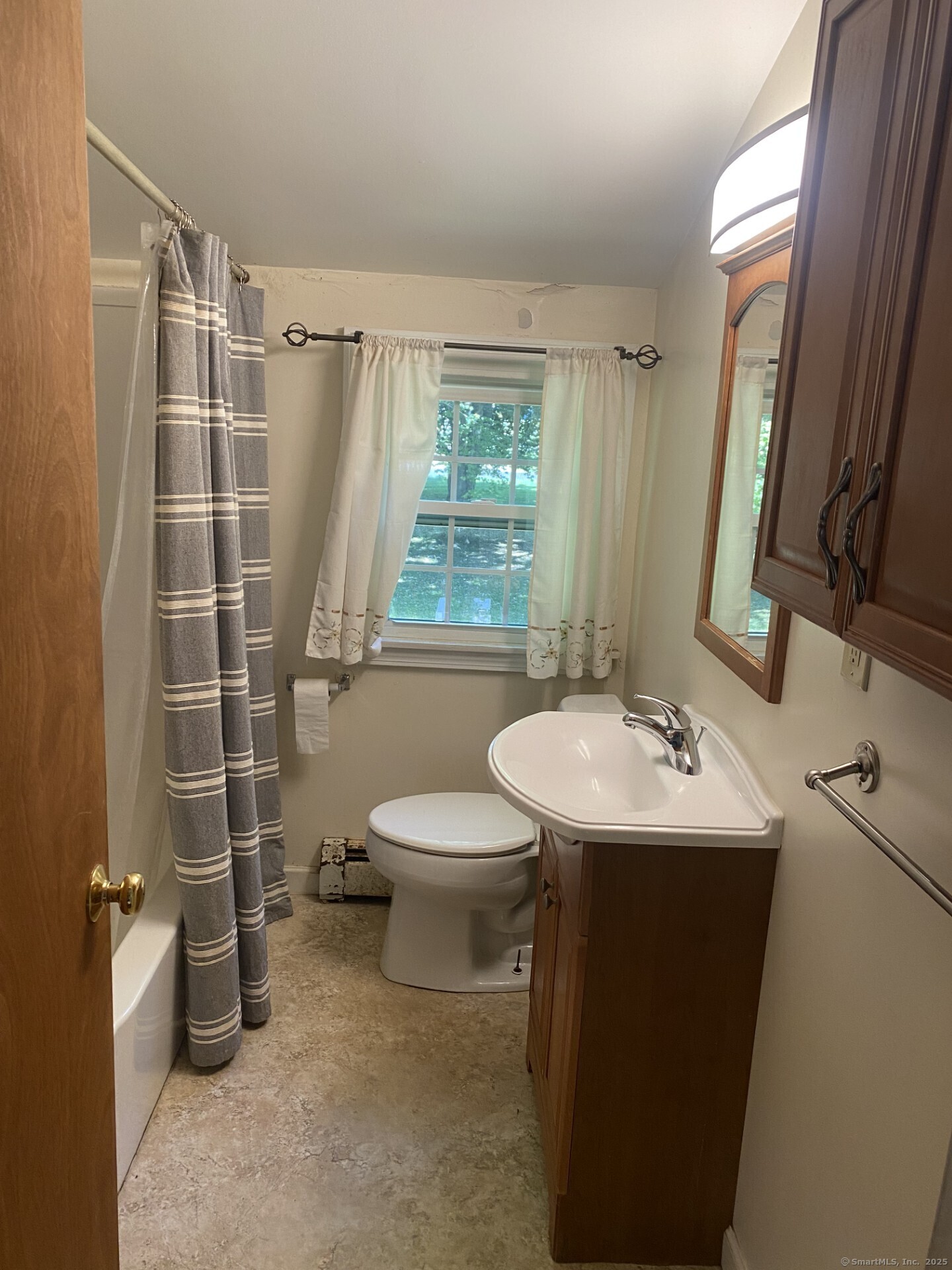 45 Monroe Road Enfield, CT 06082 - Photo 7 of 12 a bathroom with a sink toilet and shower