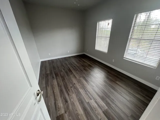 a view of an empty room and window