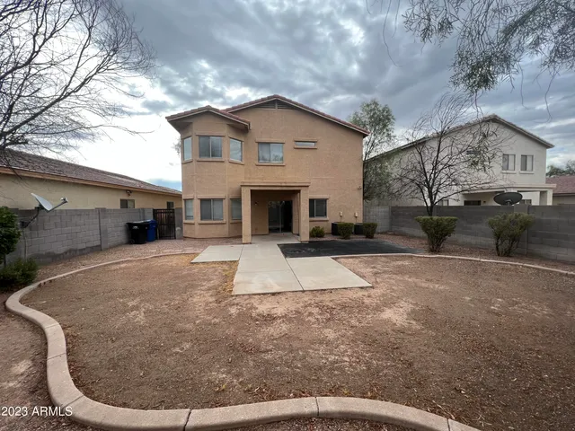 a view of a house with a patio
