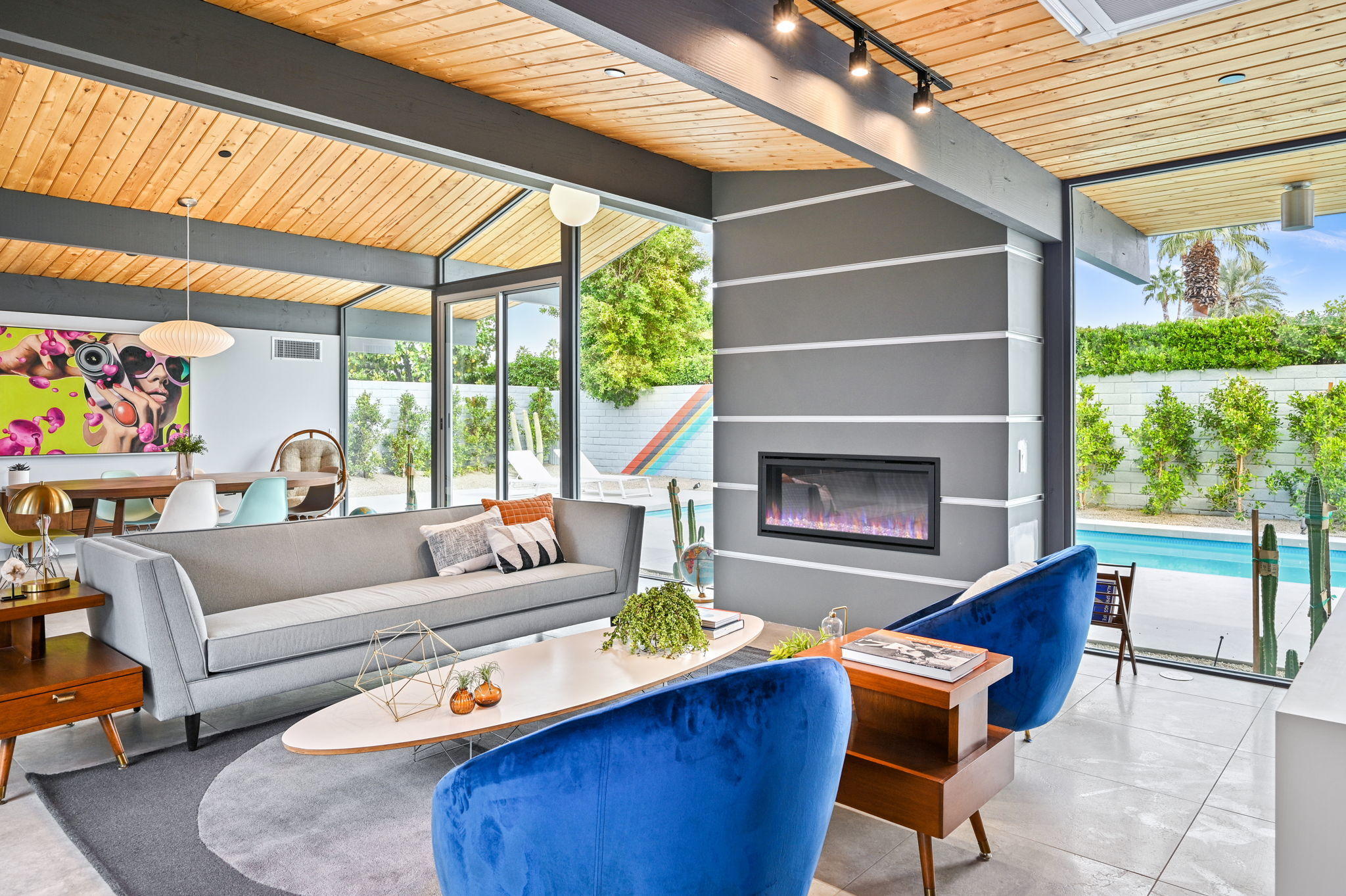 36668 Palm View Road Rancho Mirage, CA 92270 - Photo 12 of 49 a living room with furniture a fireplace and a large window