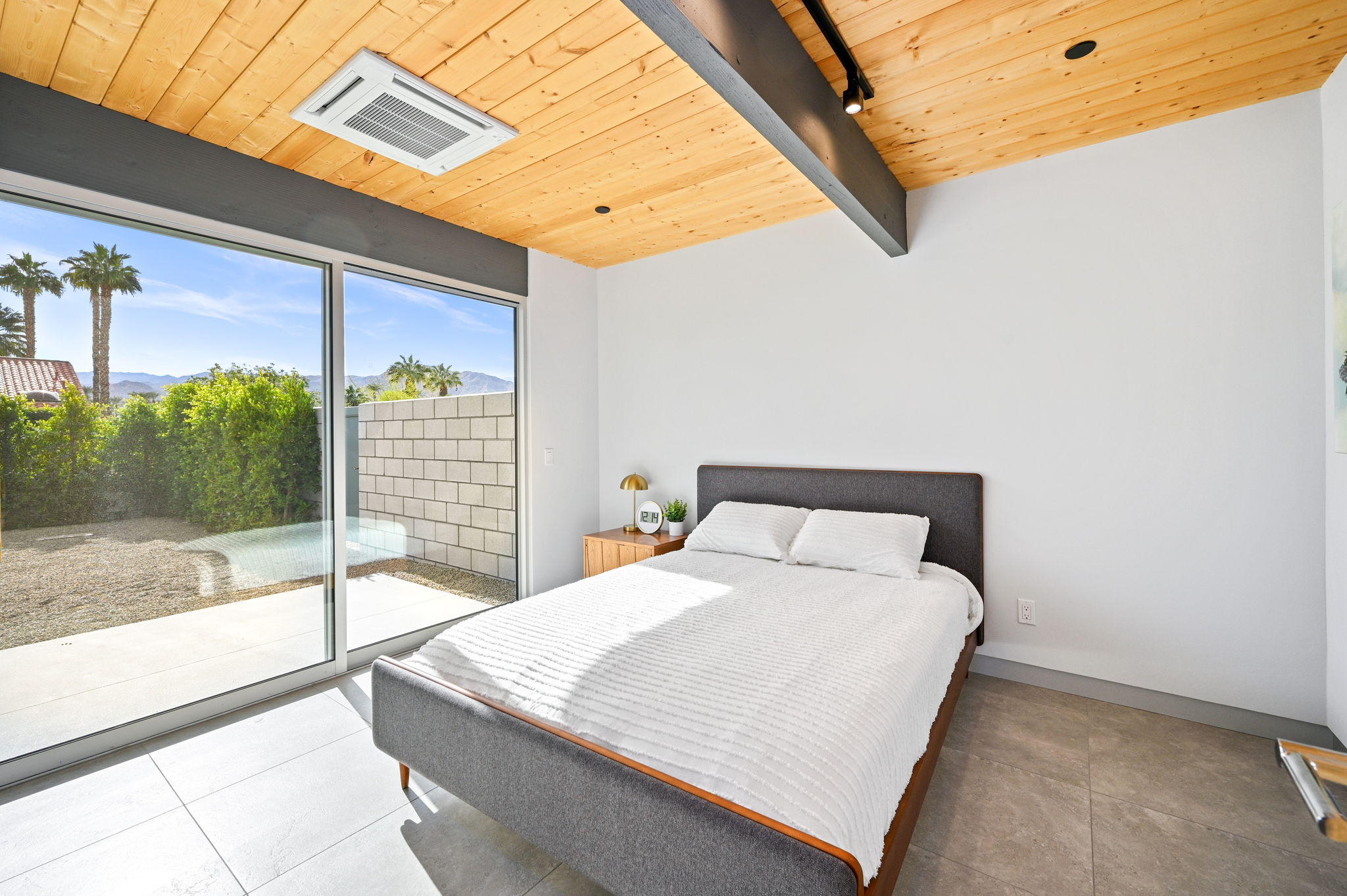 36668 Palm View Road Rancho Mirage, CA 92270 - Photo 26 of 49 a large bed sitting in a bedroom next to a window