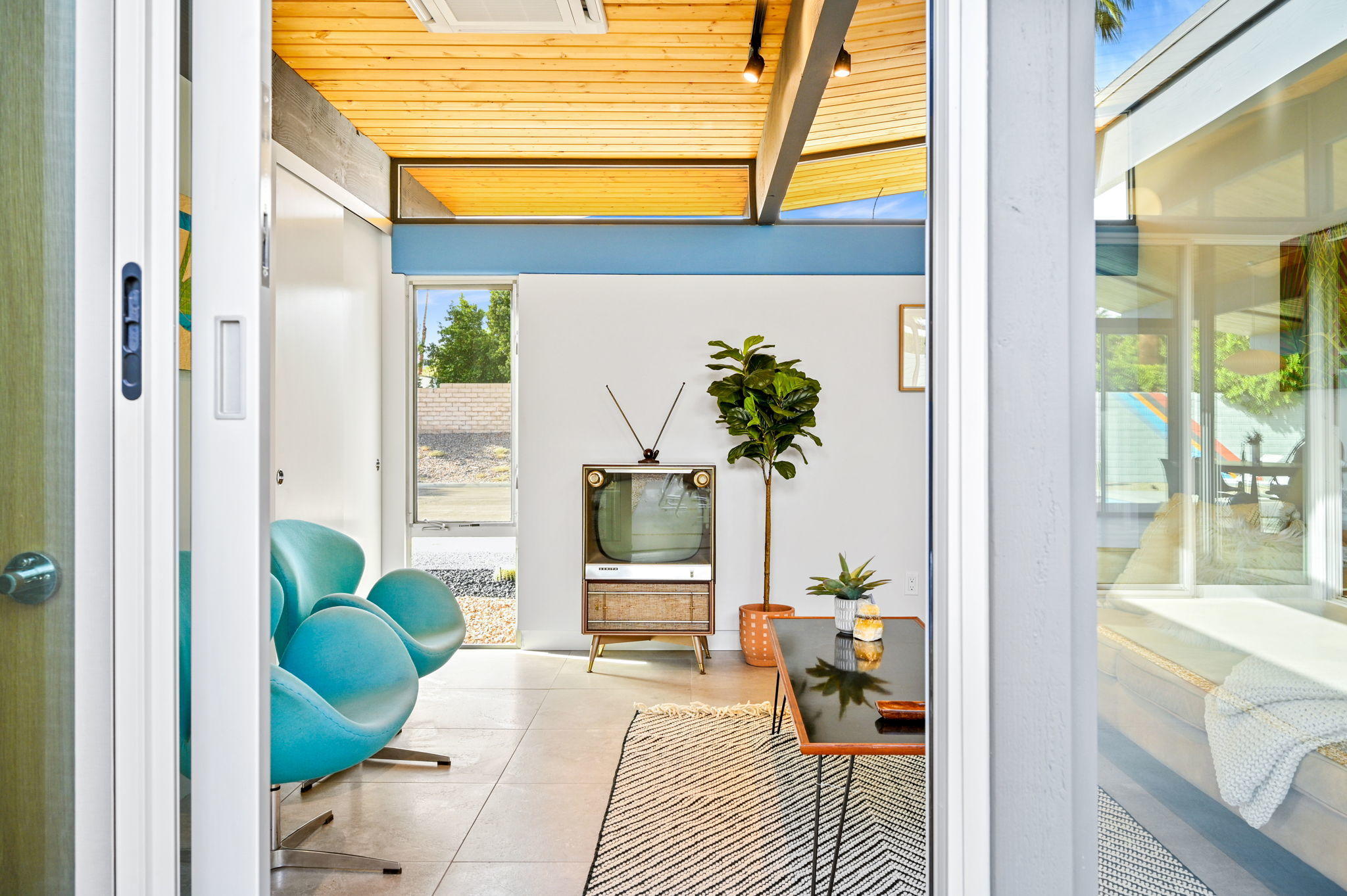 36668 Palm View Road Rancho Mirage, CA 92270 - Photo 30 of 49 a living room with furniture and a potted plant