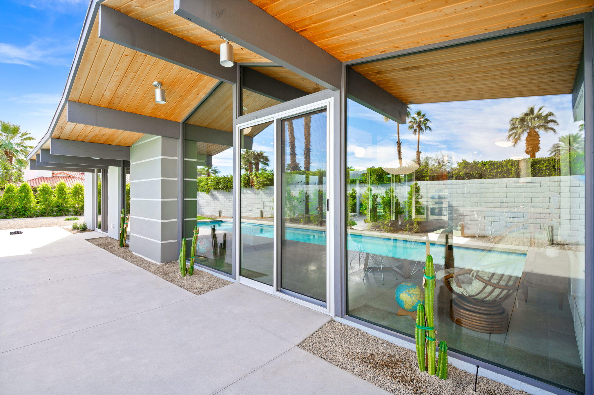 36668 Palm View Road Rancho Mirage, CA 92270 - Photo 34 of 49 a view of a patio with a table and chairs