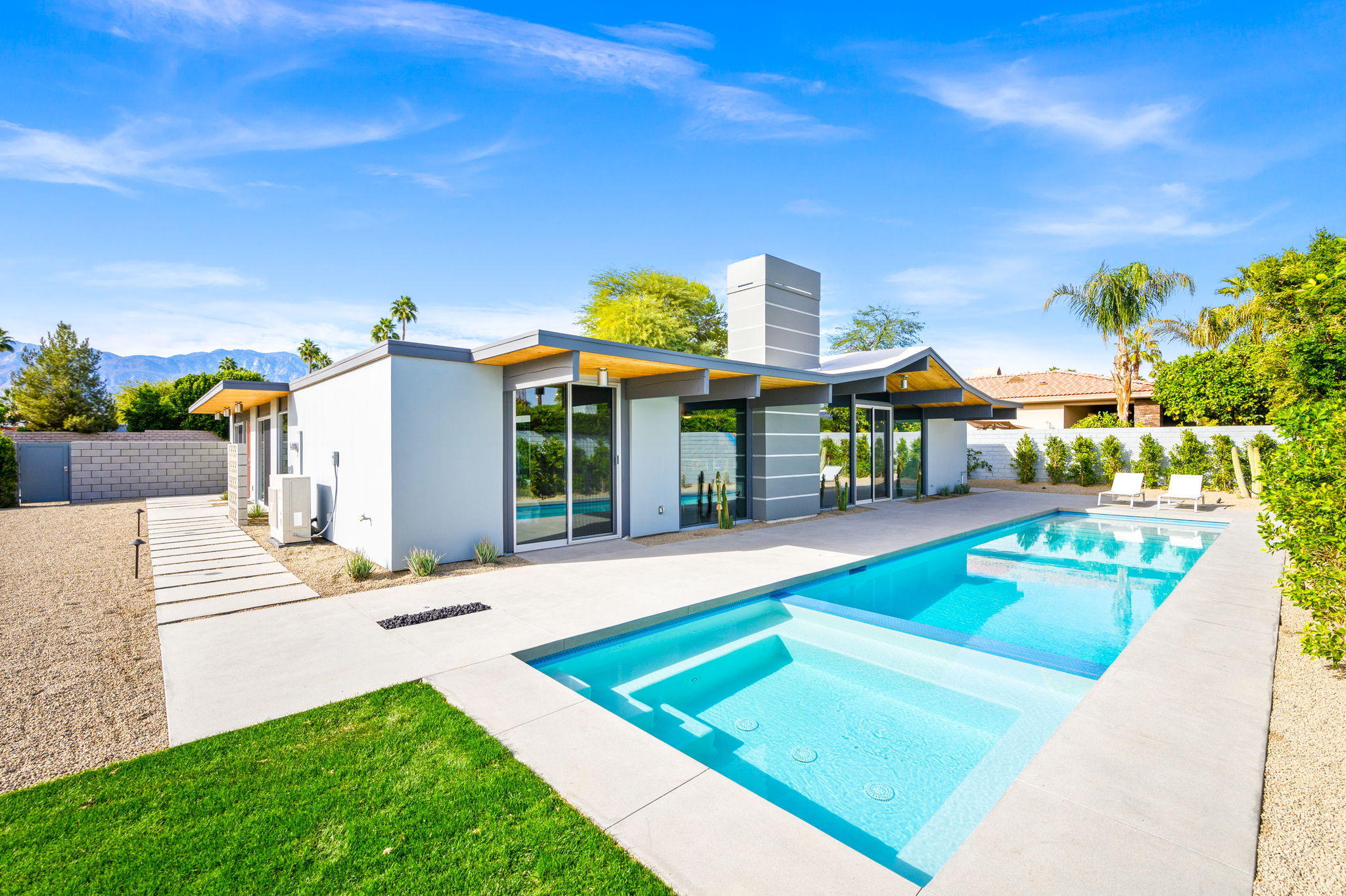 36668 Palm View Road Rancho Mirage, CA 92270 - Photo 37 of 49 a view of a house with swimming pool and sitting area