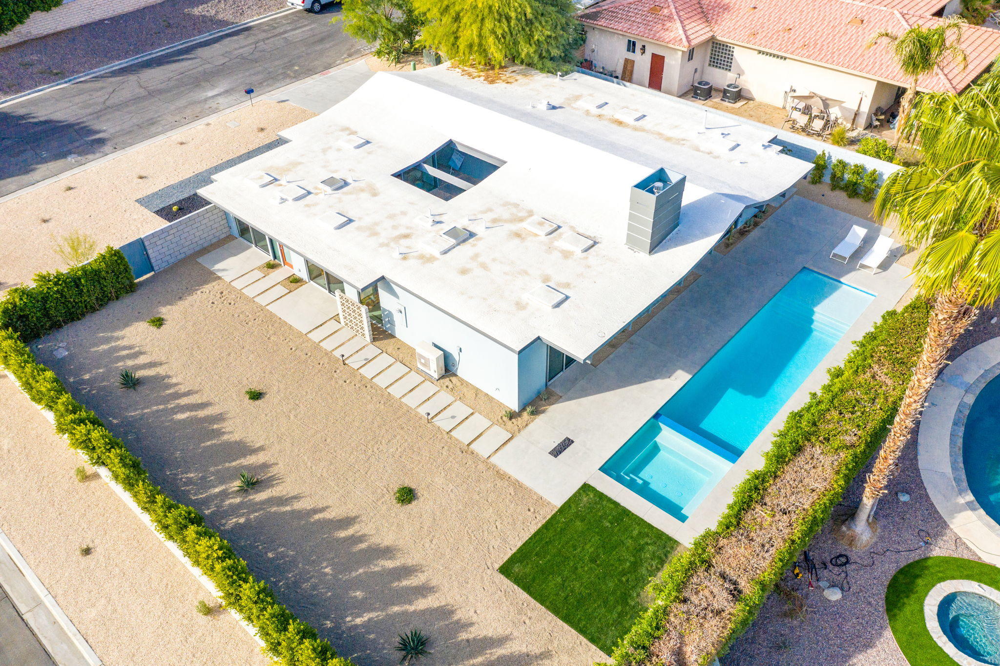 36668 Palm View Road Rancho Mirage, CA 92270 - Photo 43 of 49 a view of a swimming pool with a patio