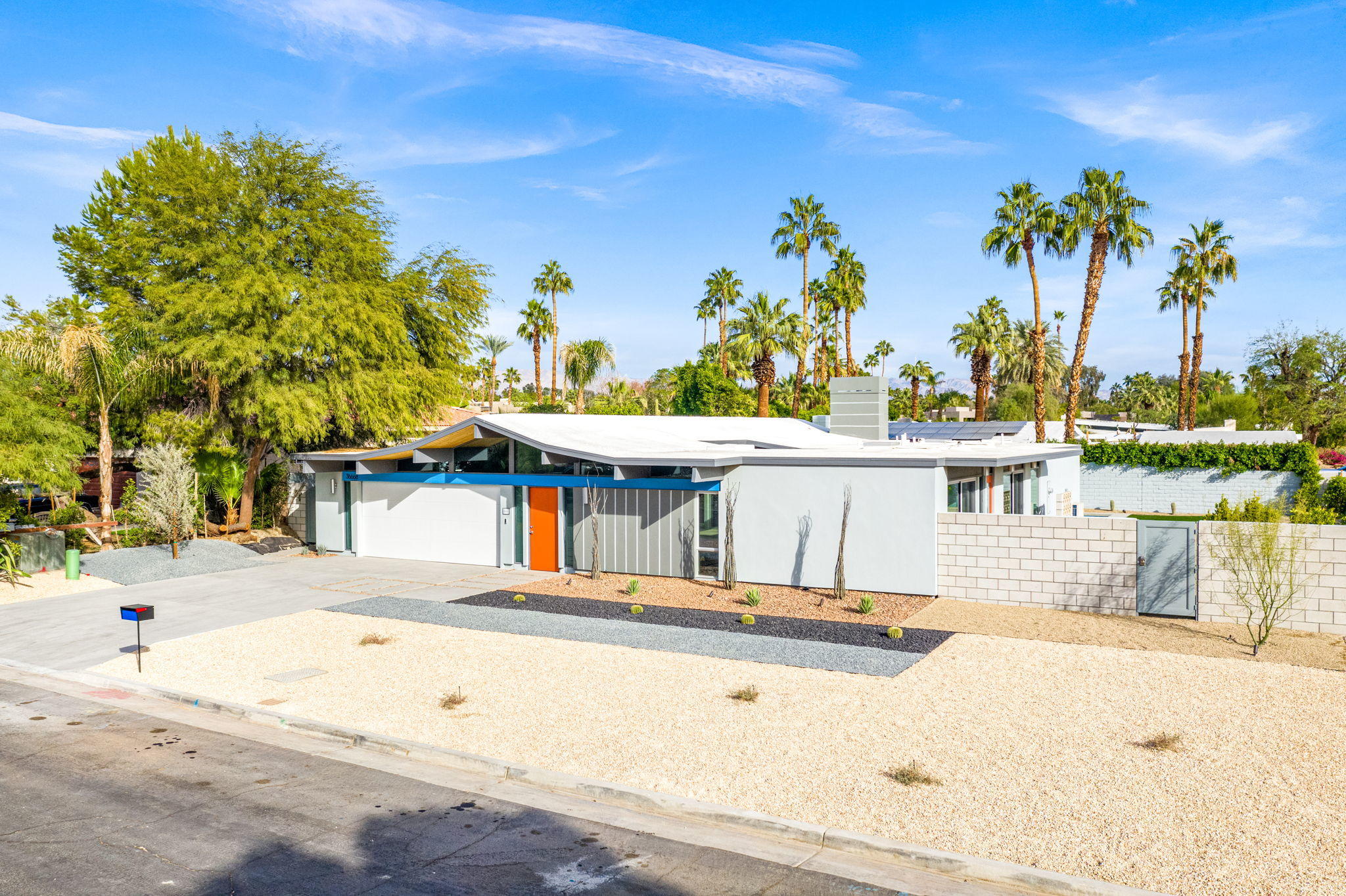36668 Palm View Road Rancho Mirage, CA 92270 - Photo 45 of 49 a view of a swimming pool with a lawn chairs