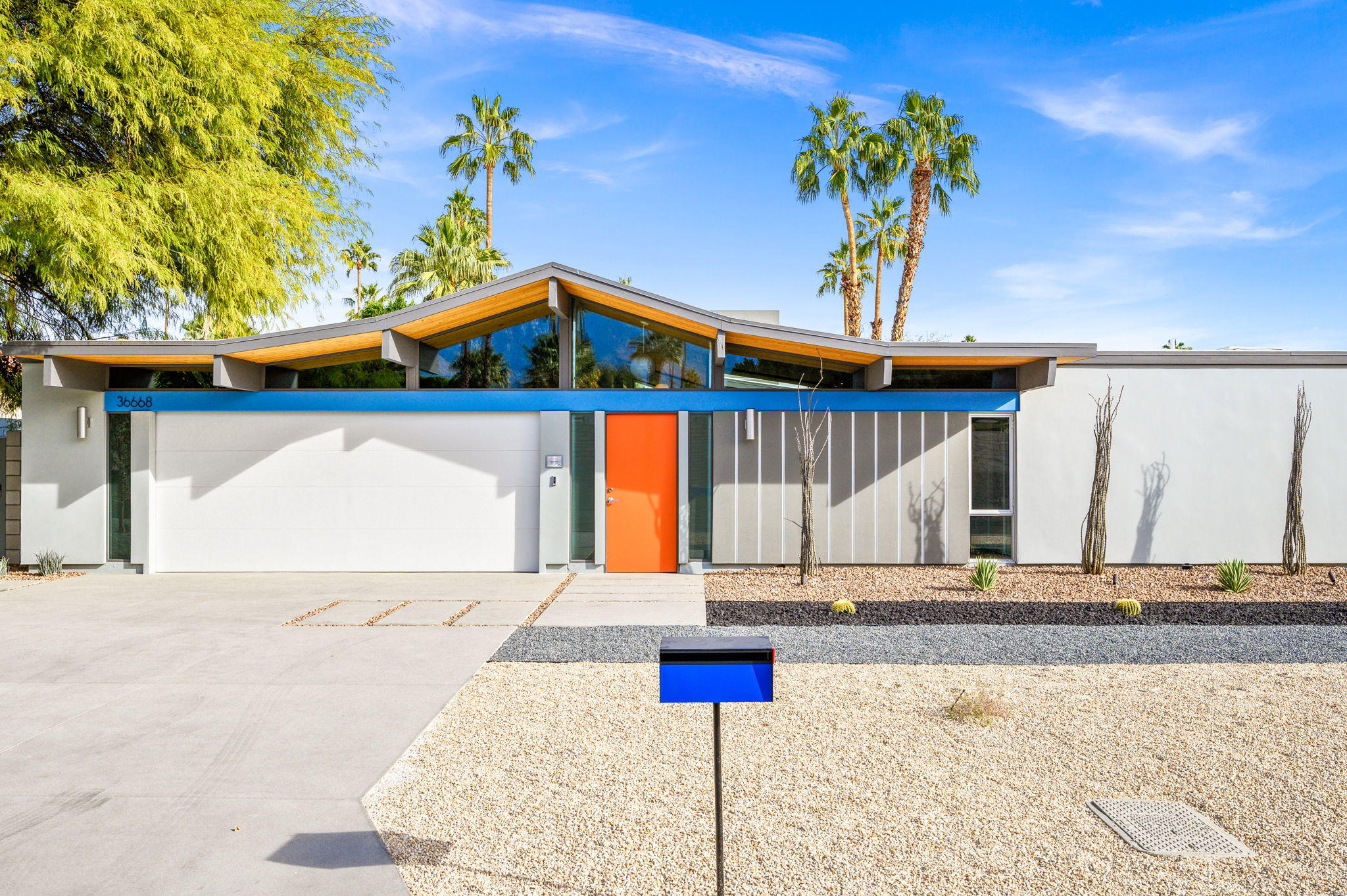 36668 Palm View Road Rancho Mirage, CA 92270 - Photo 49 of 49 a front view of a house with a yard
