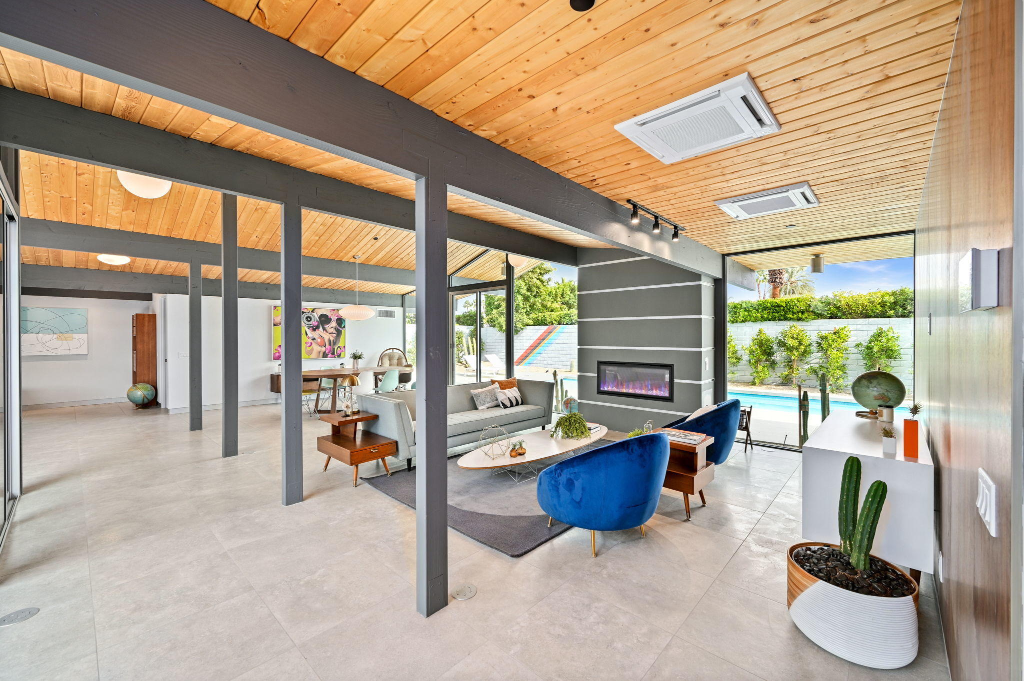 36668 Palm View Road Rancho Mirage, CA 92270 - Photo 10 of 49 a living room filled with furniture and a large window