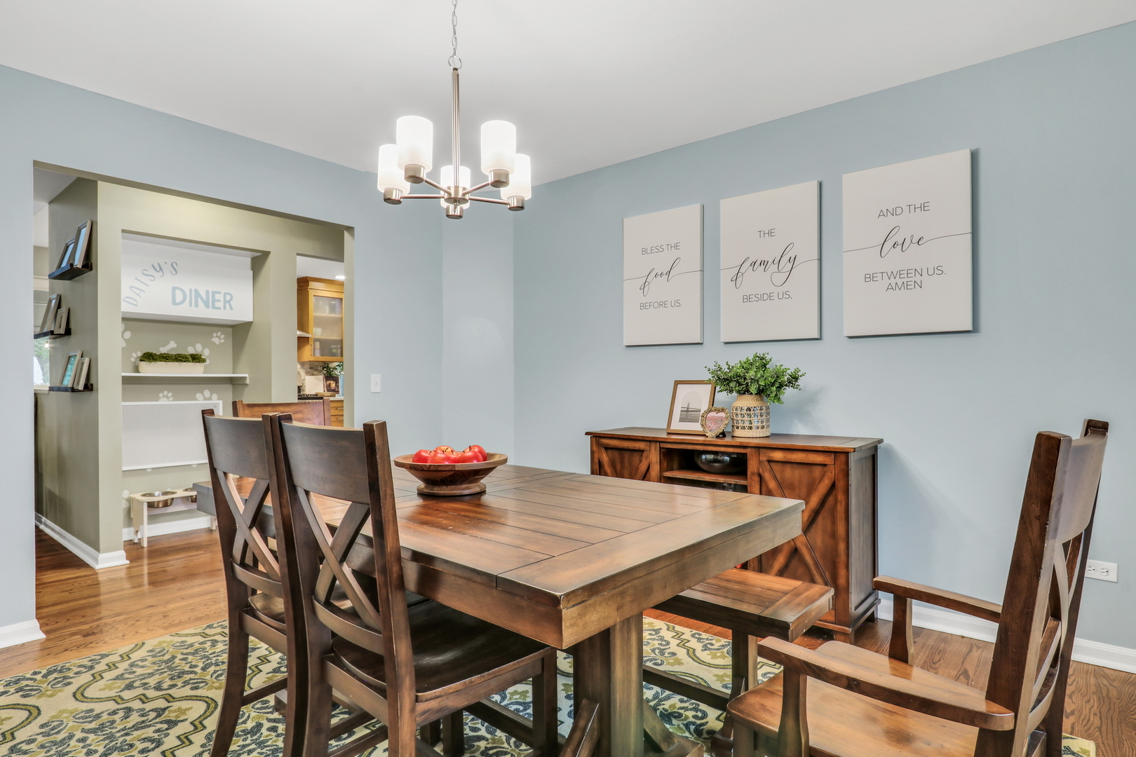6183 Old Farm Lane Gurnee, IL 60031 - Photo 16 of 52 a view of a dining room with furniture and chandelier