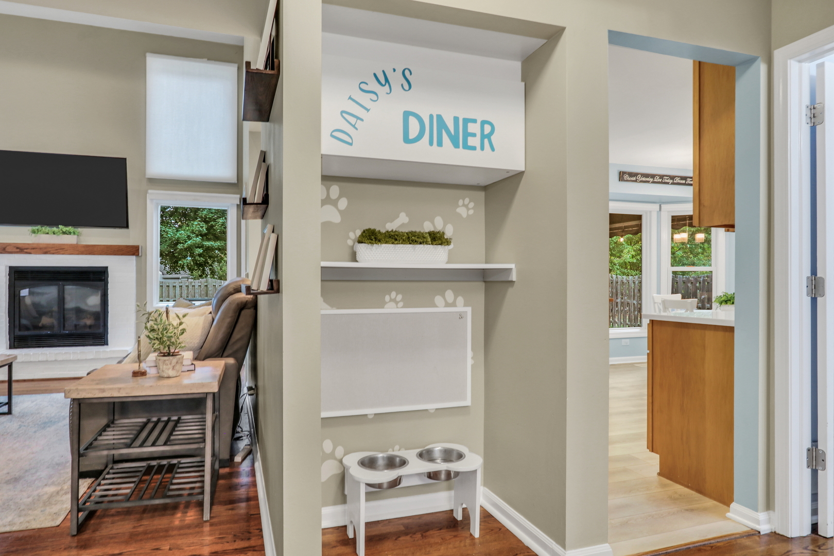 6183 Old Farm Lane Gurnee, IL 60031 - Photo 40 of 52 a dining room with furniture a fireplace and a flat screen tv