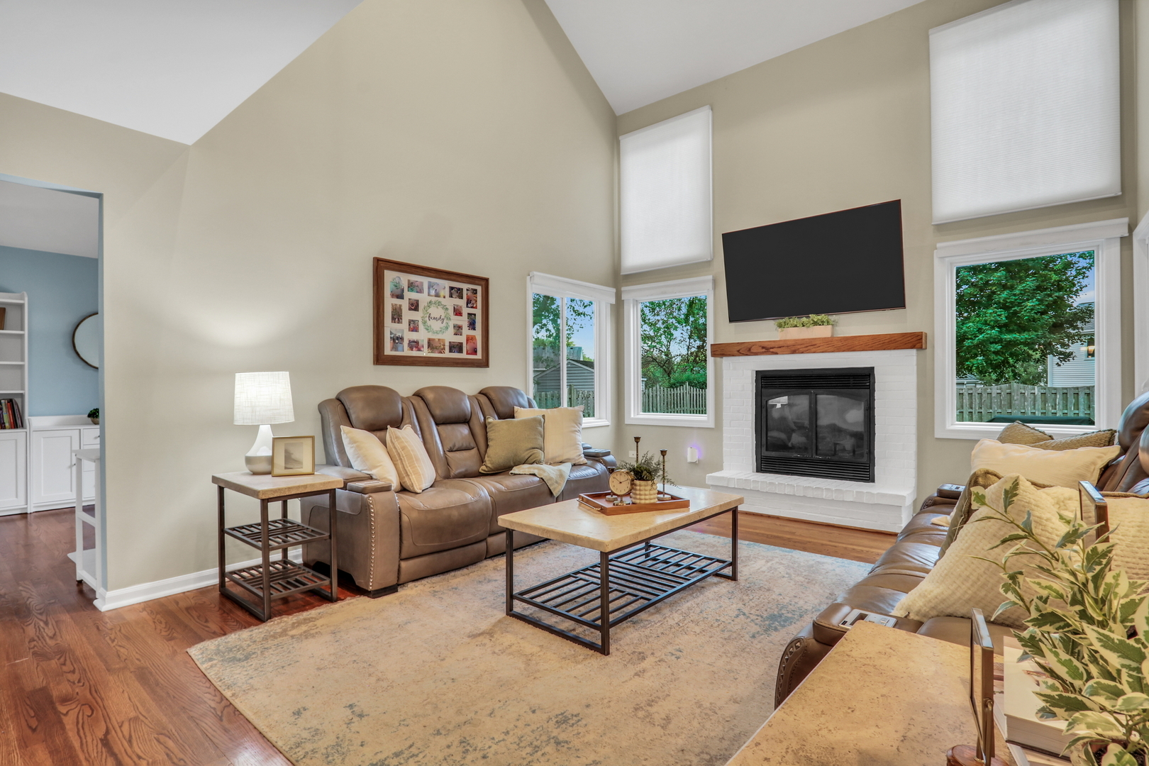 6183 Old Farm Lane Gurnee, IL 60031 - Photo 5 of 52 a living room with furniture flat screen tv and a fireplace