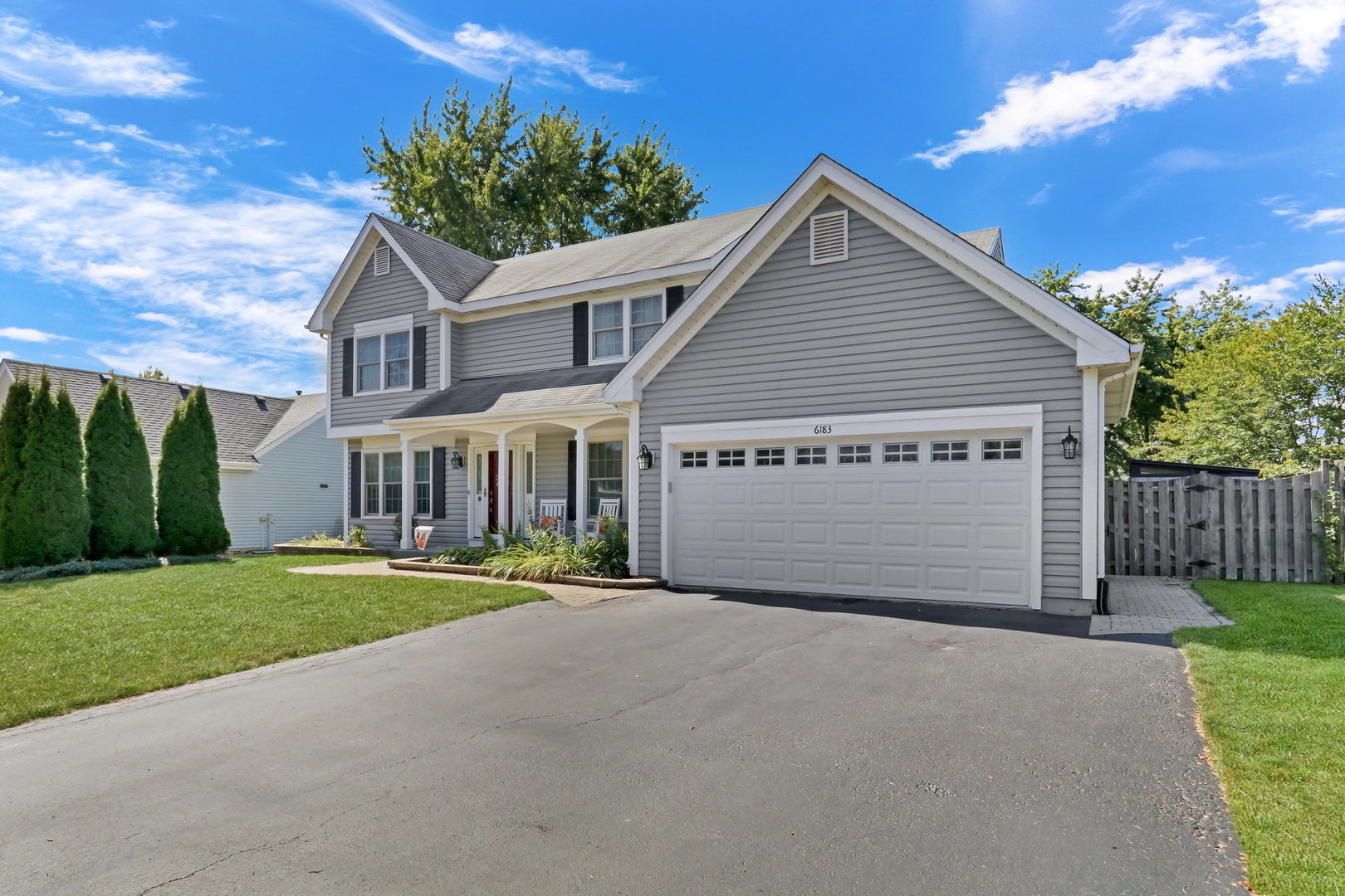 6183 Old Farm Lane Gurnee, IL 60031 - Photo 52 of 52 a view of a house with a yard and garage