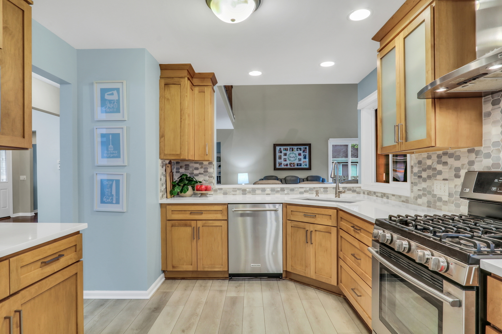 6183 Old Farm Lane Gurnee, IL 60031 - Photo 10 of 52 a kitchen with stainless steel appliances granite countertop a stove and a sink