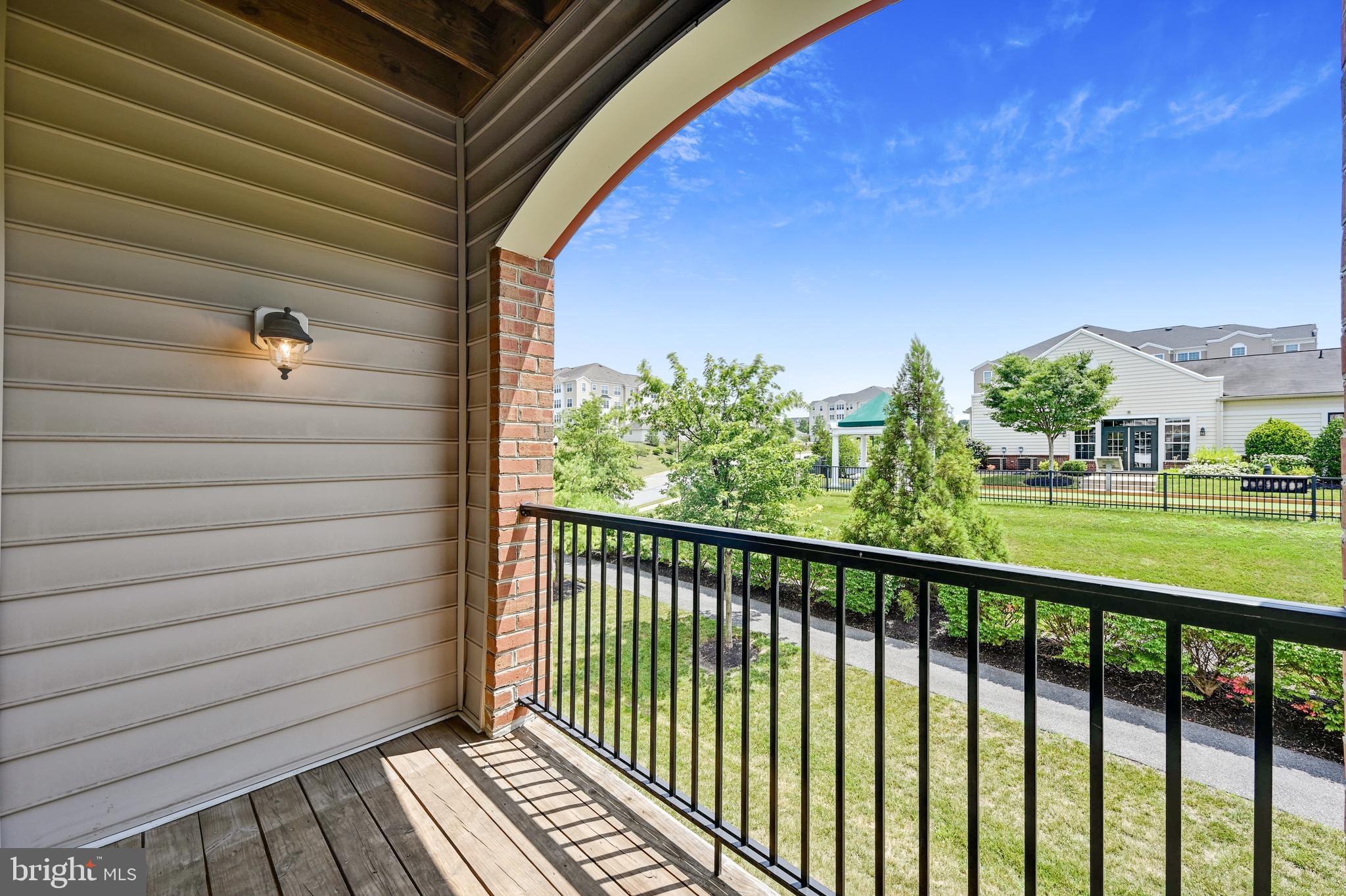 8601 Roaming Ridge Way, Unit 204 Odenton, MD 21113 - Photo 28 of 46 Private Balcony Overlooking Clubhouse