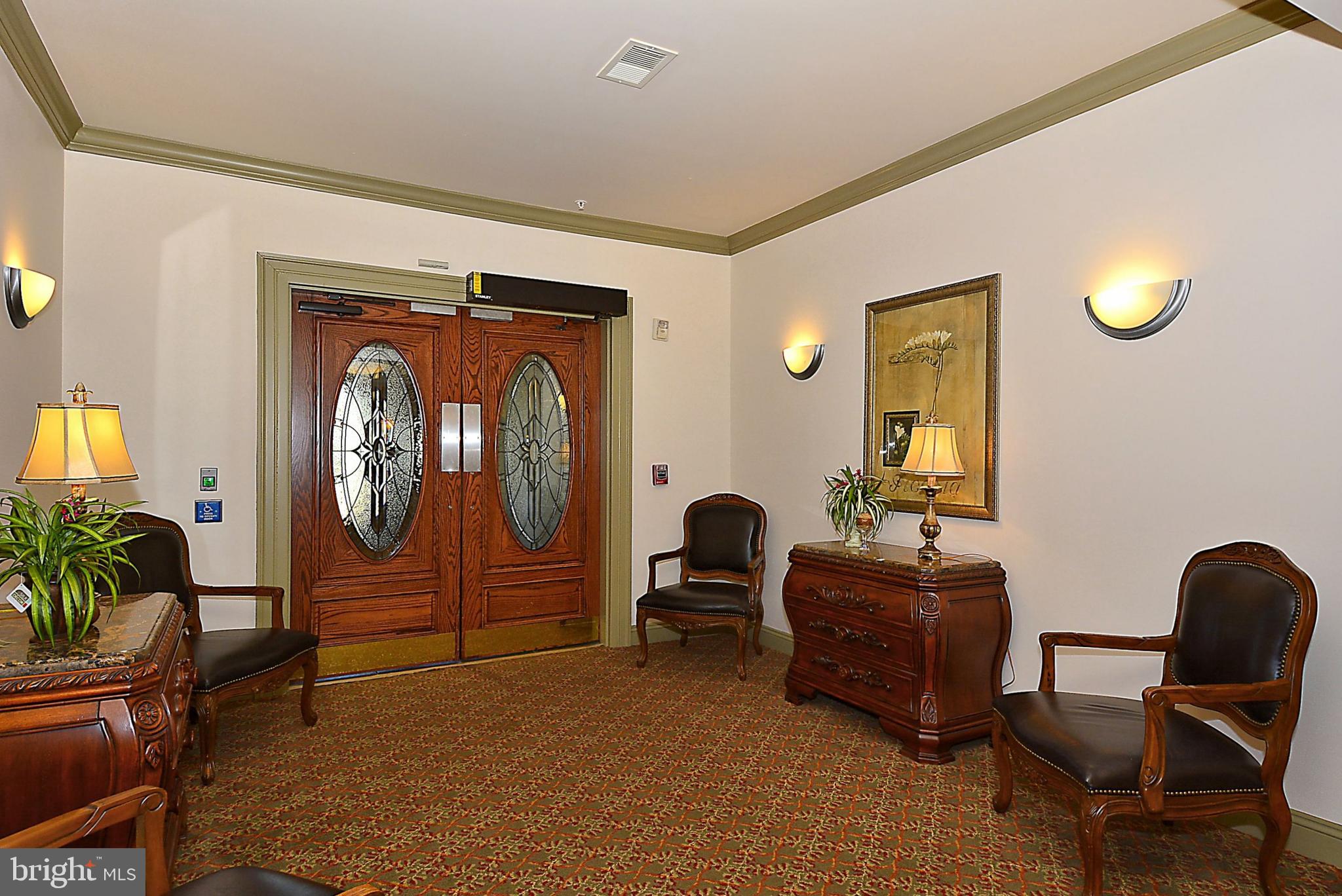 8601 Roaming Ridge Way, Unit 204 Odenton, MD 21113 - Photo 4 of 46 Welcoming Entrance Foyer
