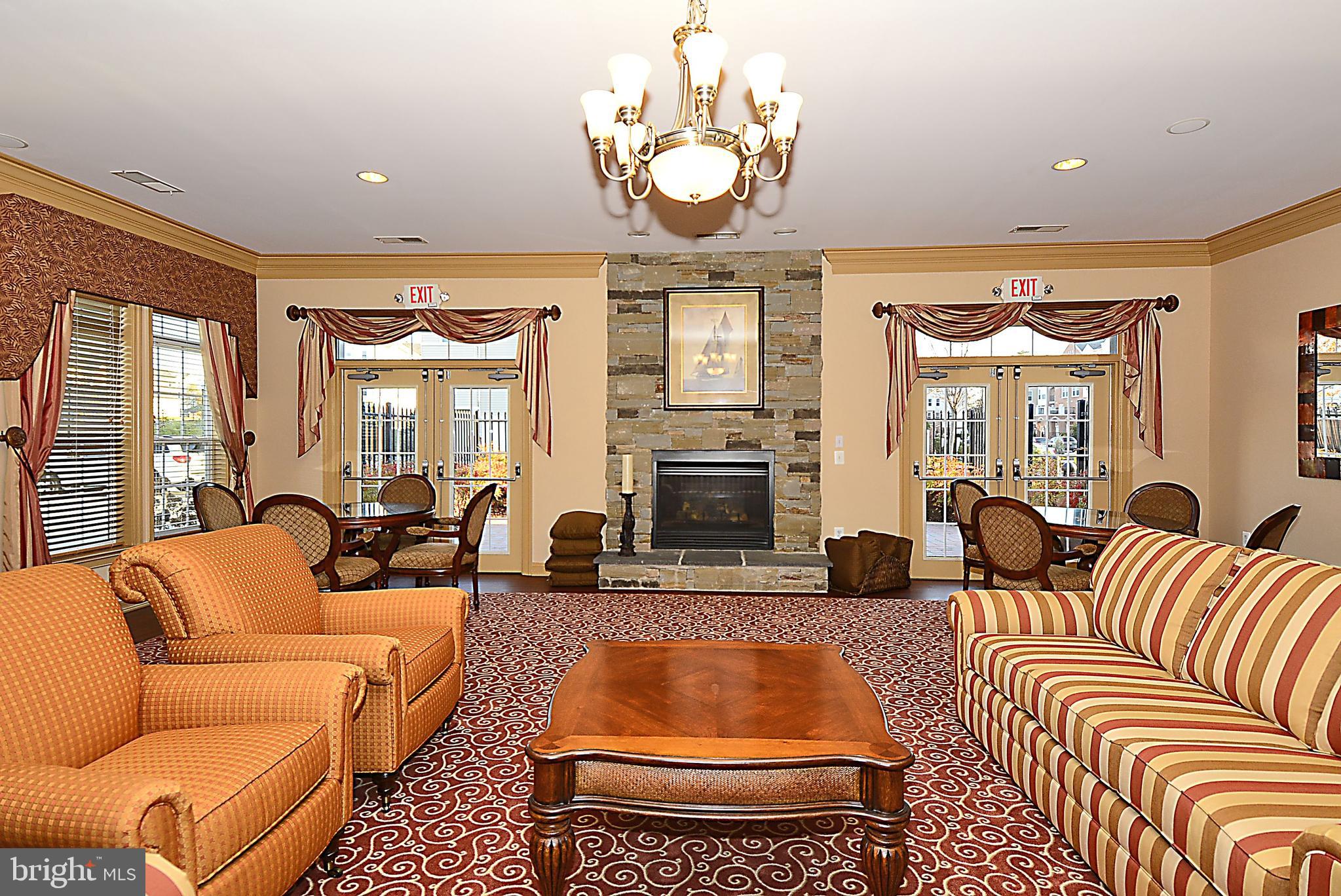 8601 Roaming Ridge Way, Unit 204 Odenton, MD 21113 - Photo 32 of 46 Clubhouse Gathering Room
