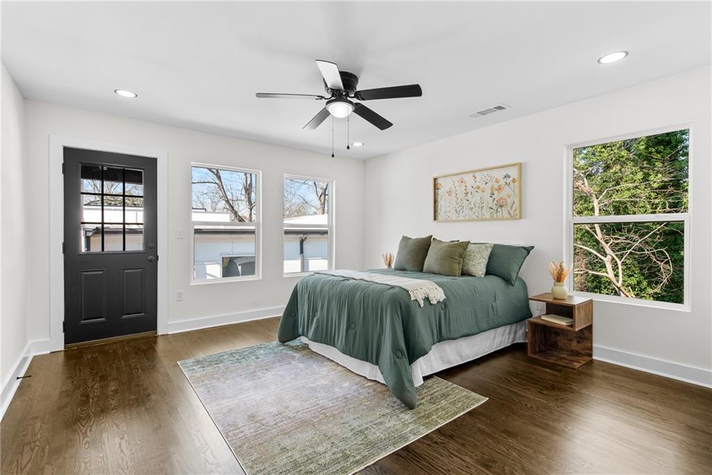 968 Bruce Circle Southeast Atlanta, GA 30316 - Photo 12 of 40 a living room with a bed furniture and windows