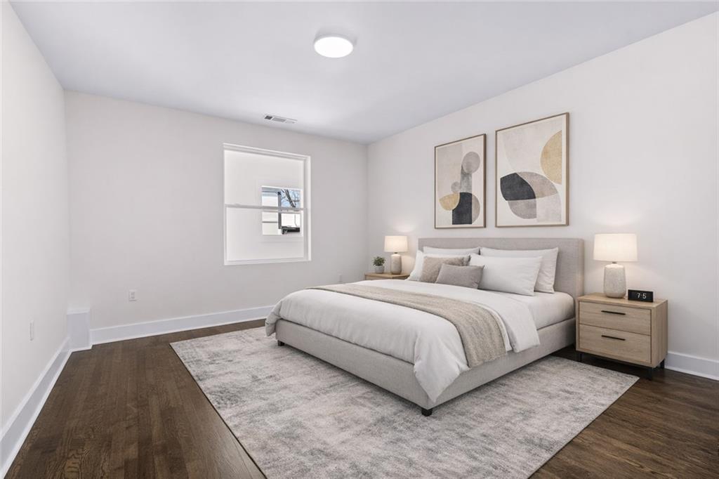 968 Bruce Circle Southeast Atlanta, GA 30316 - Photo 19 of 40 a bedroom with a large bed and a window