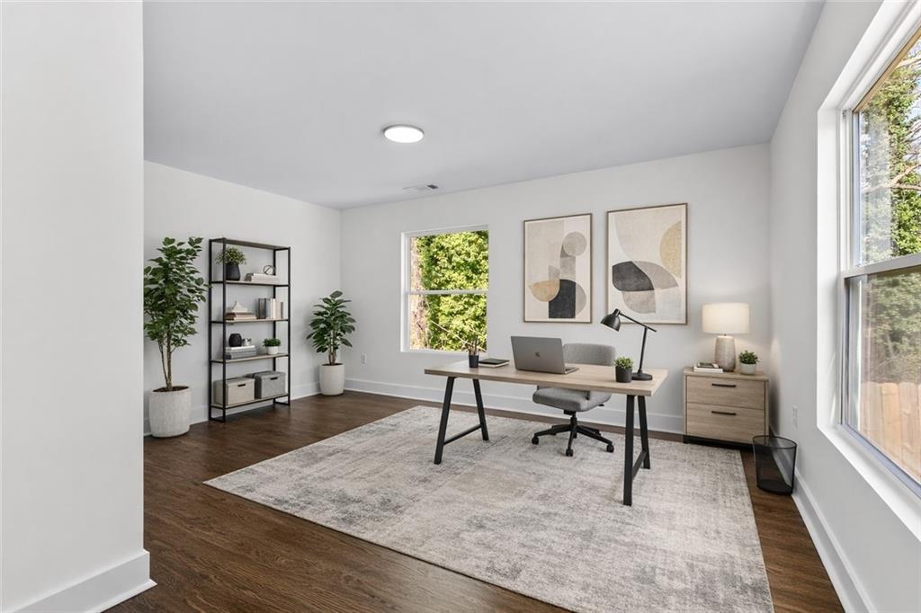 968 Bruce Circle Southeast Atlanta, GA 30316 - Photo 21 of 40 a living room with furniture and a large window