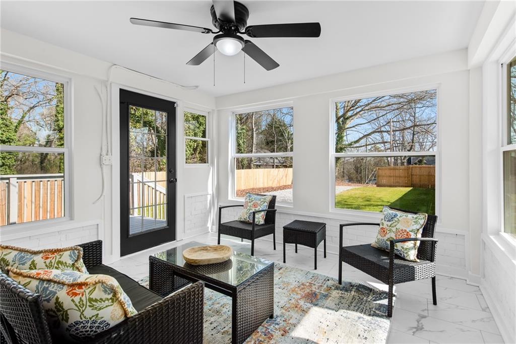 968 Bruce Circle Southeast Atlanta, GA 30316 - Photo 27 of 40 a living room with furniture and a window