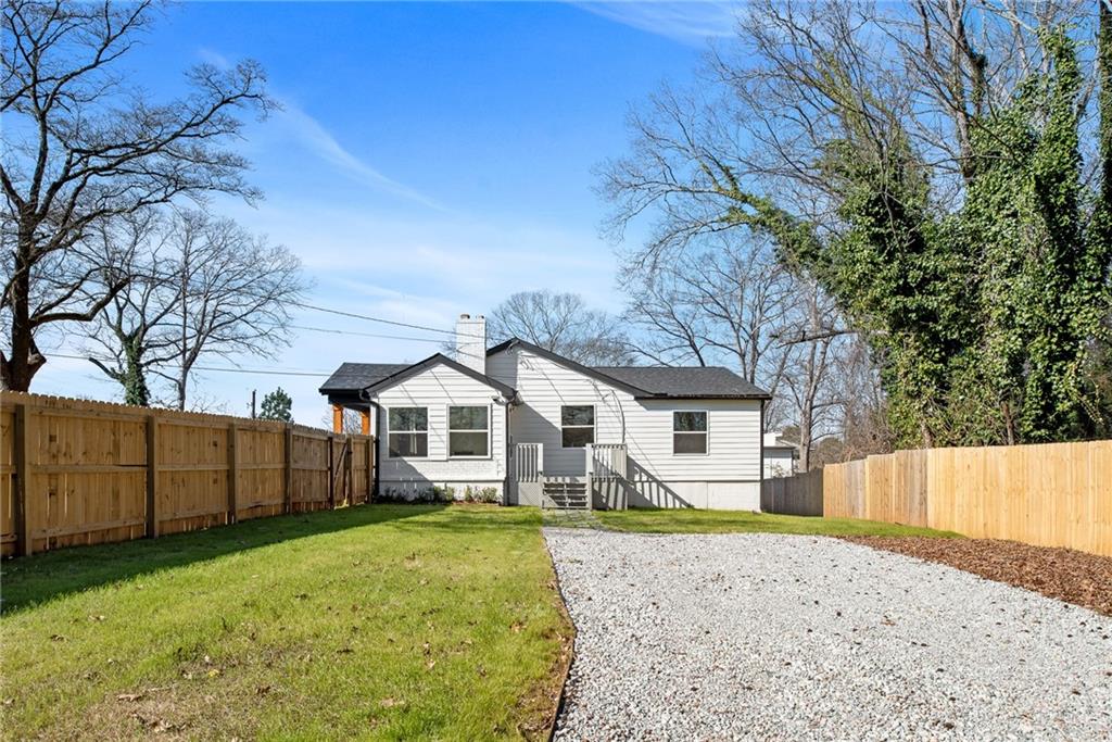968 Bruce Circle Southeast Atlanta, GA 30316 - Photo 30 of 40 front view of a house with a yard