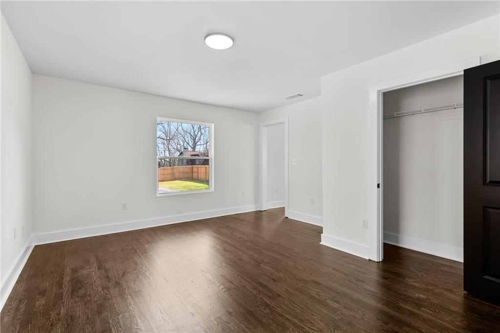 968 Bruce Circle Southeast Atlanta, GA 30316 - Photo 40 of 40 an empty room with wooden floor and window